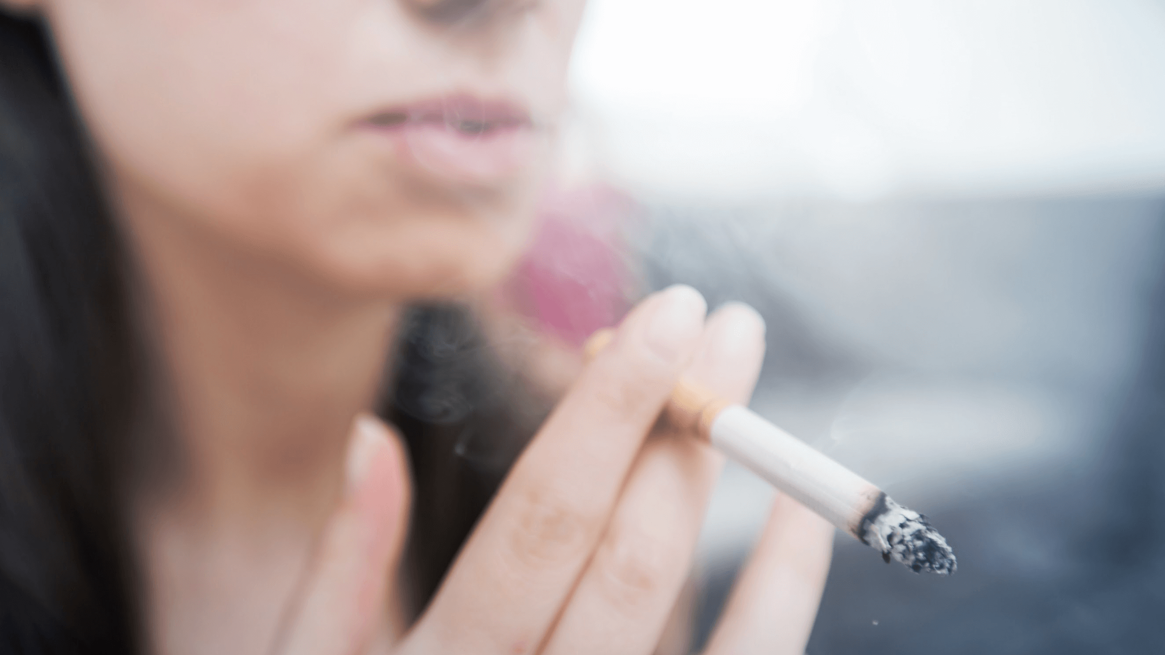 woman smoking a cigarette